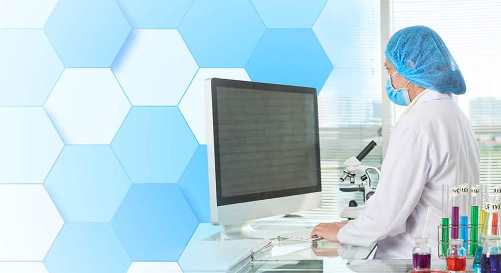 Lab technician storing data inside a computer